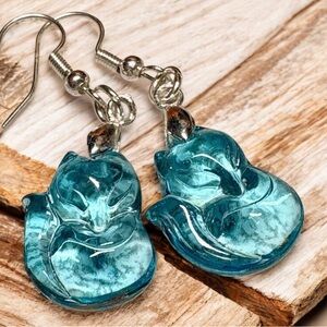 Elegant carved Blue Fox Earrings